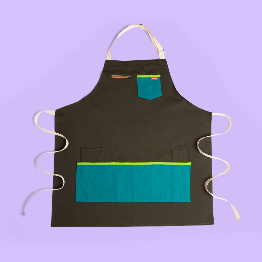 Quell art apron in forest green and lime with front pockets
