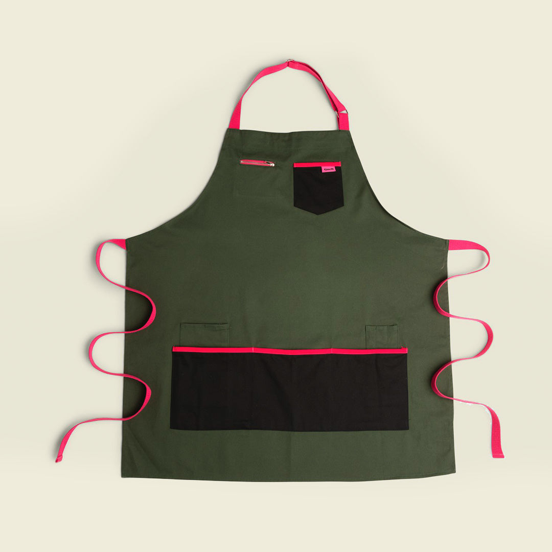 Quell art apron in olive and pink with front pockets