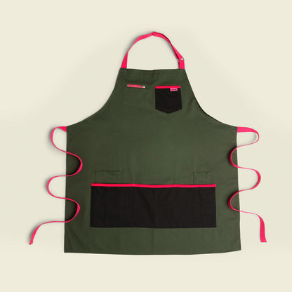Quell art apron in olive and pink with front pockets